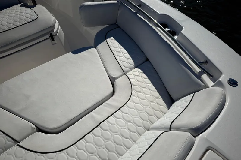 Lucky Penny Yacht Photos Pics Luxurious seating on 2022 Sea Fox 288 Commander boat, featuring elegant upholstery design.
