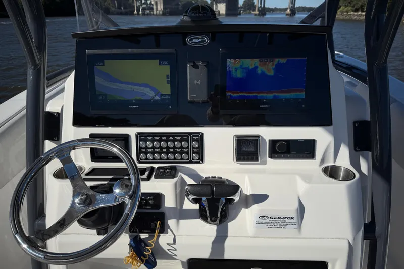 Lucky Penny Yacht Photos Pics 2022 Sea Fox 288 Commander dashboard with navigation and control systems.