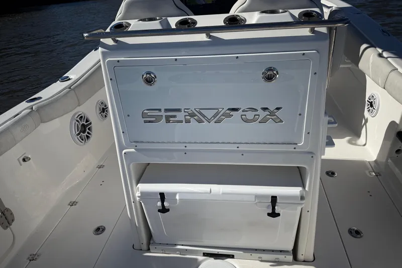 Lucky Penny Yacht Photos Pics 2022 Sea Fox 288 Commander boat interior with branded console and seating.