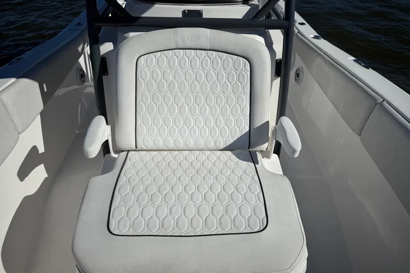 Lucky Penny Yacht Photos Pics 2022 Sea Fox 288 Commander boat seat with hexagonal pattern upholstery.