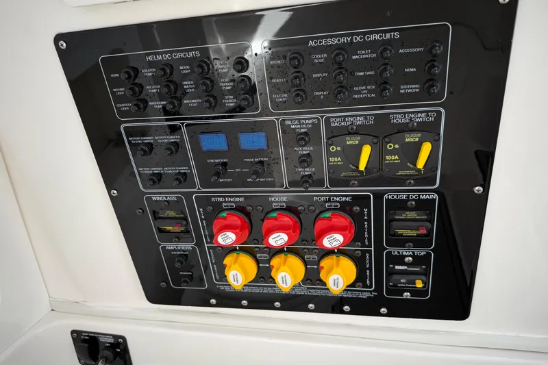 Lucky Penny Yacht Photos Pics Control panel of a 2022 Sea Fox 288 Commander boat with various switches and gauges.