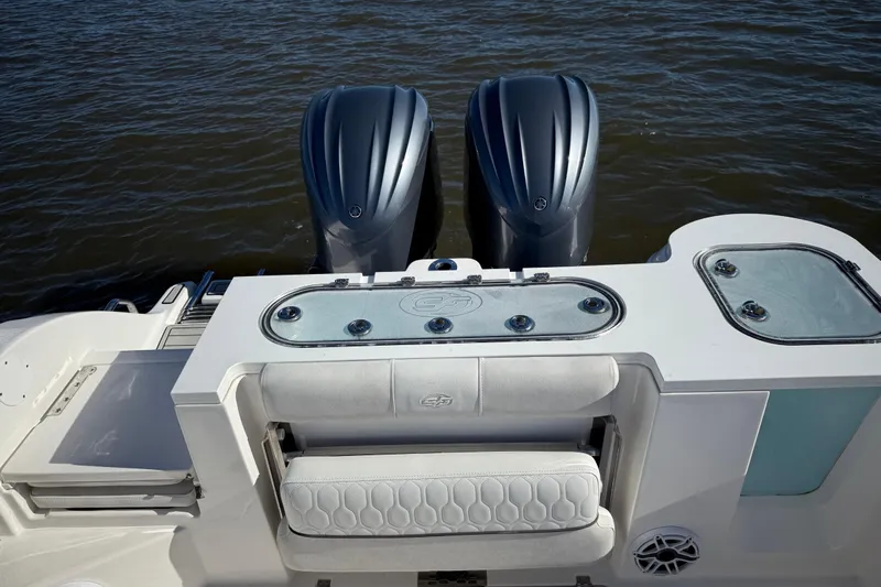 Lucky Penny Yacht Photos Pics 2022 Sea Fox 288 Commander boat with dual engines and seating, on water.