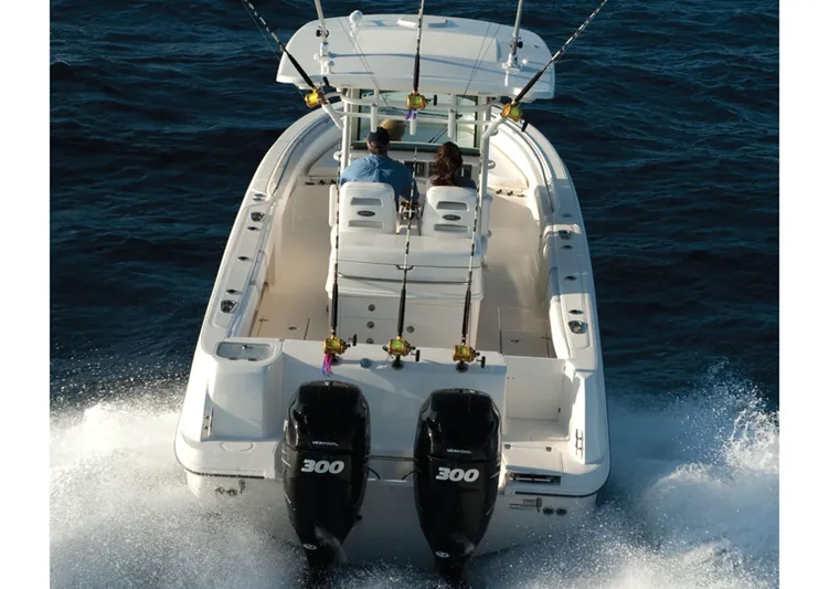  Yacht Photos Pics 2015 Boston Whaler 320 Outrage boat with dual 300 HP engines on the water.