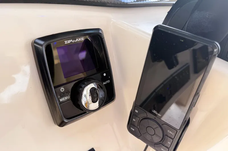  Yacht Photos Pics Zipwake control panel and Vesper device on 2022 Grady-White Canyon 456 boat.