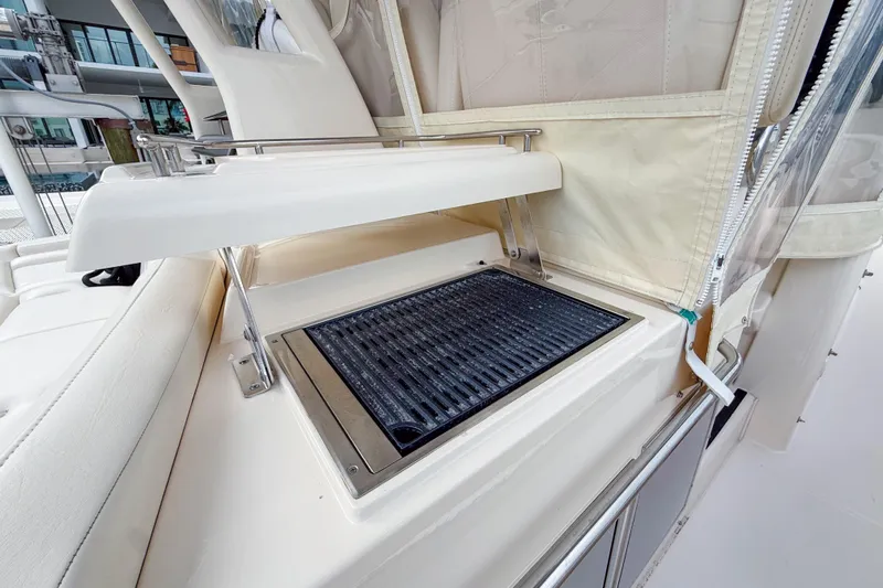  Yacht Photos Pics 2022 Grady-White Canyon 456 boat grill station with sleek design and modern features.
