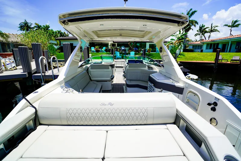  Yacht Photos Pics 2022 Sea Ray SLX 310 OB luxury boat with spacious seating and elegant design.