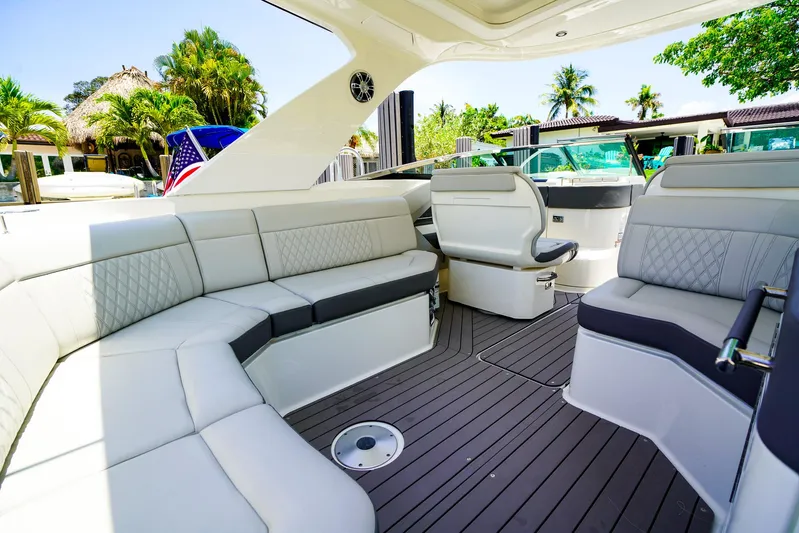  Yacht Photos Pics 2022 Sea Ray SLX 310 OB boat interior with luxurious seating and modern design.