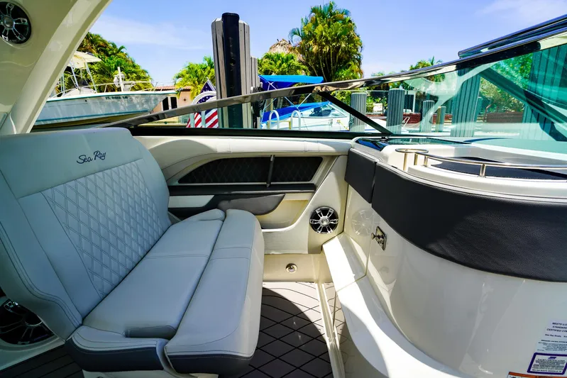  Yacht Photos Pics 2022 Sea Ray SLX 310 OB interior with luxurious seating and sleek design.