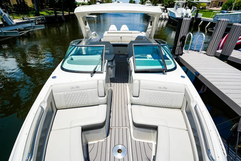  Yacht Photos Pics 2022 Sea Ray SLX 310 OB luxury boat with spacious seating and sleek design.