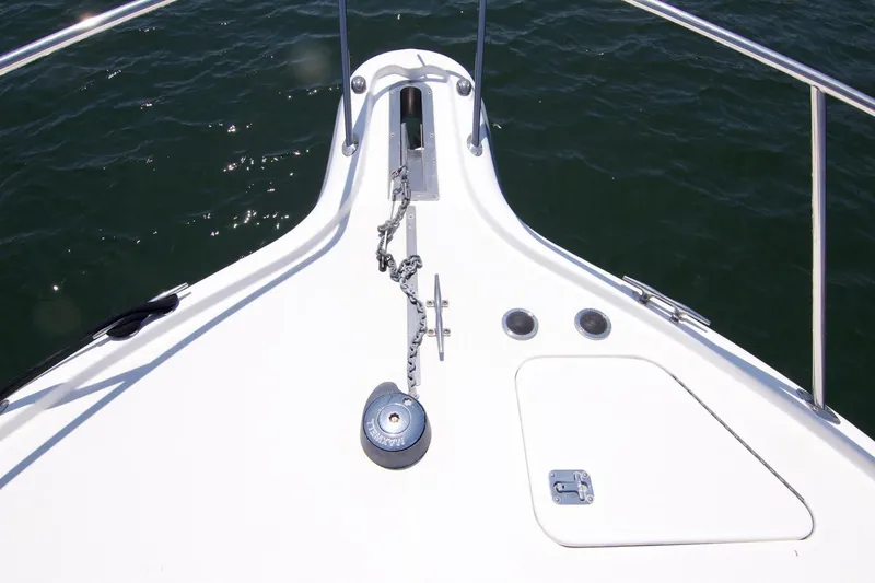 Revelry Yacht Photos Pics Bow of 2002 Tiara Yachts 3500 Open with anchor chain and ocean view.