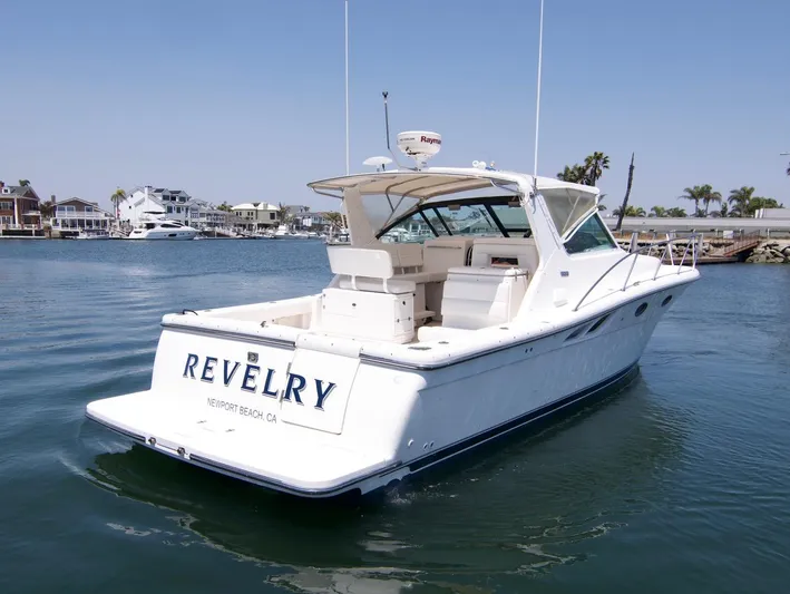 Revelry Yacht Photos Pics 2002 Tiara Yachts 3500 Open in Newport Beach marina, rear view.