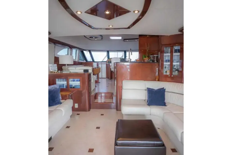 My Reality Yacht Photos Pics Luxurious interior of 2012 Neptunus 62 Flybridge yacht with elegant seating and modern design.