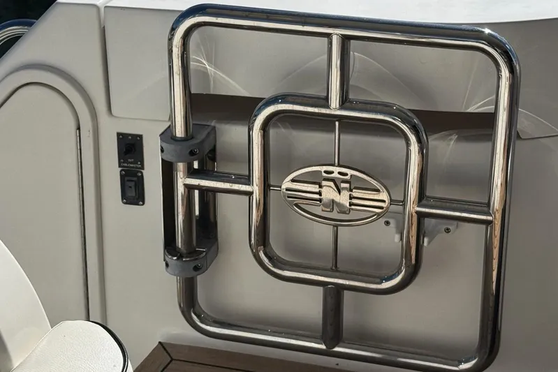 My Reality Yacht Photos Pics Stainless steel railing with Neptunus logo on 2012 Neptunus 62 Flybridge yacht.