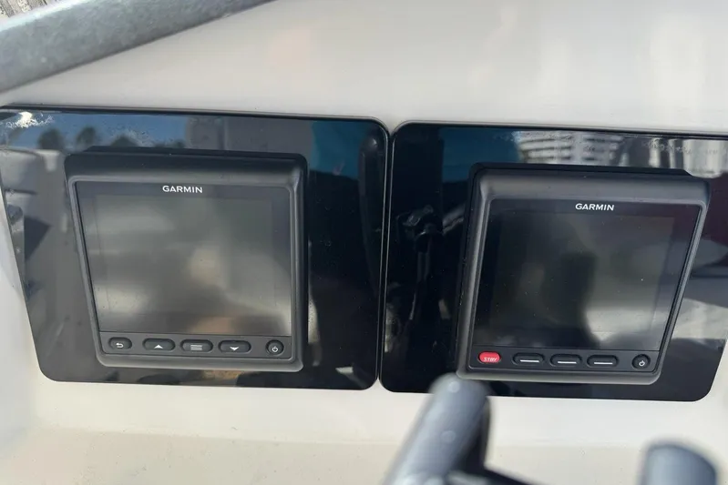 My Reality Yacht Photos Pics Garmin navigation displays on 2012 Neptunus 62 Flybridge yacht dashboard.