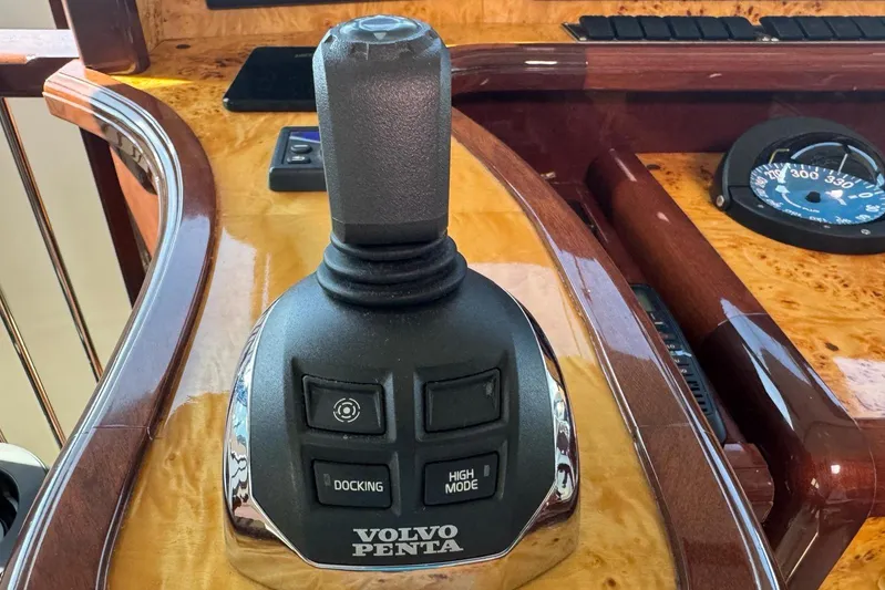 My Reality Yacht Photos Pics Volvo Penta joystick control on 2012 Neptunus 62 Flybridge yacht dashboard.
