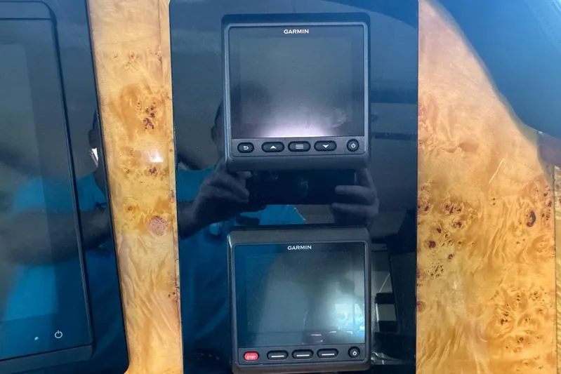 My Reality Yacht Photos Pics Garmin navigation screens on 2012 Neptunus 62 Flybridge yacht dashboard.