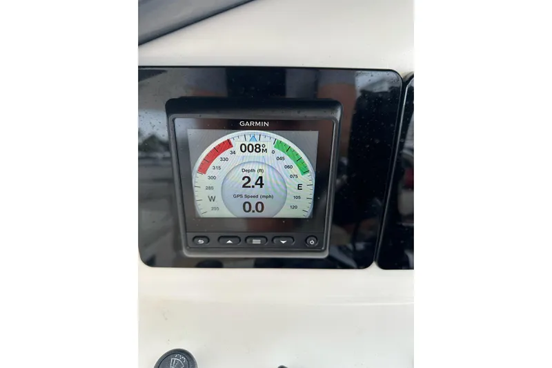 My Reality Yacht Photos Pics Garmin display on 2012 Neptunus 62 Flybridge showing depth and GPS speed.