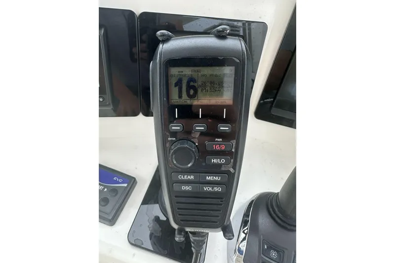 My Reality Yacht Photos Pics VHF radio on 2012 Neptunus 62 Flybridge yacht dashboard.