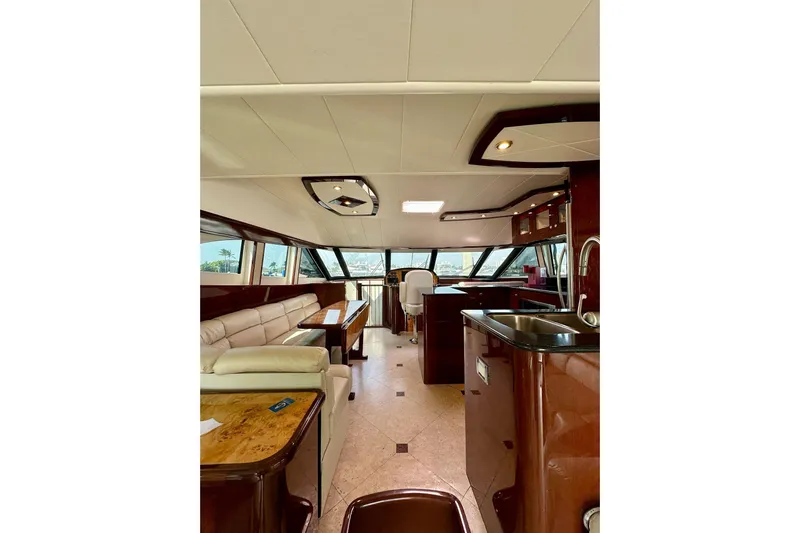 My Reality Yacht Photos Pics Luxurious interior of 2012 Neptunus 62 Flybridge yacht with modern furnishings.