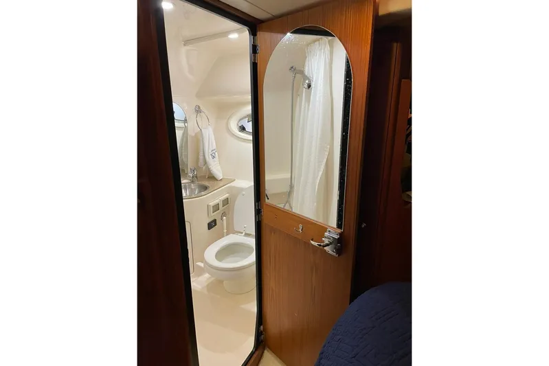  Yacht Photos Pics 2012 Tiara Yachts 3100 Coronet bathroom with sink, toilet, and shower.