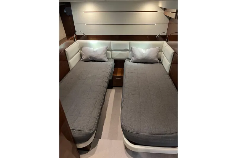  Yacht Photos Pics Interior of 2016 Princess 68 Flybridge Motor Yacht with twin beds and modern decor.