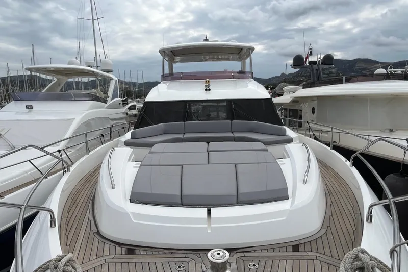  Yacht Photos Pics 2016 Princess 68 Flybridge Motor Yacht with spacious deck and luxurious seating.