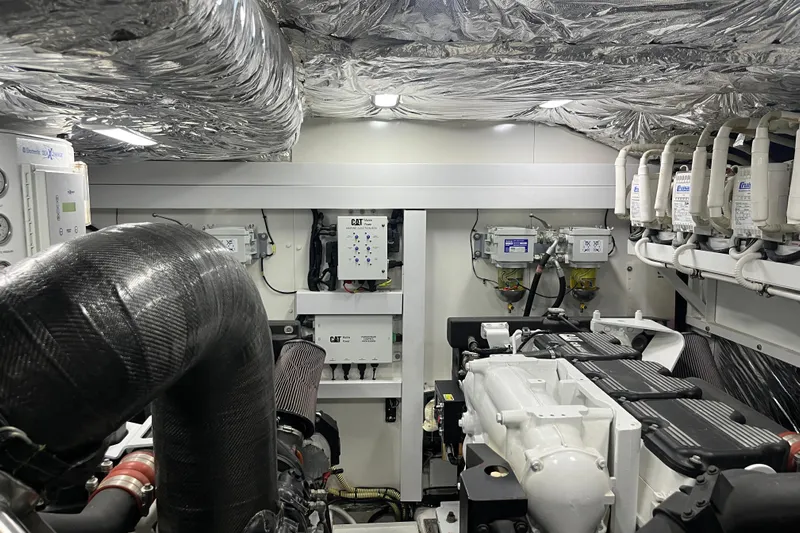  Yacht Photos Pics Engine room of 2016 Princess 68 Flybridge Motor Yacht with advanced machinery and insulation.