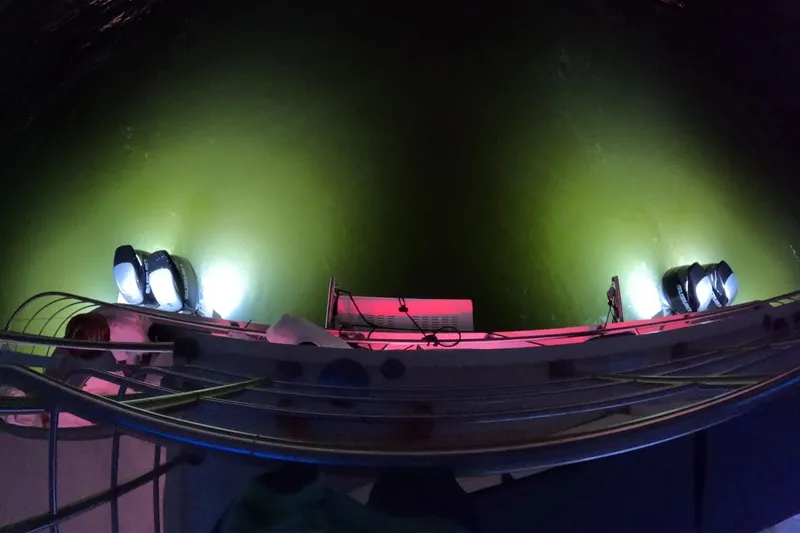  Yacht Photos Pics Custom PaxCat 80 boat with underwater lights illuminating green water, 2024 model.