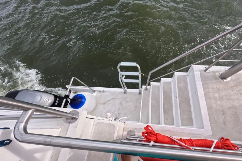  Yacht Photos Pics Custom PaxCat 80 boat deck with stairs and water view, 2024 model.