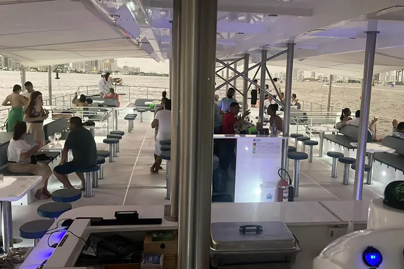  Yacht Photos Pics People enjoying a cruise on the 2024 Custom PaxCat 80 catamaran.