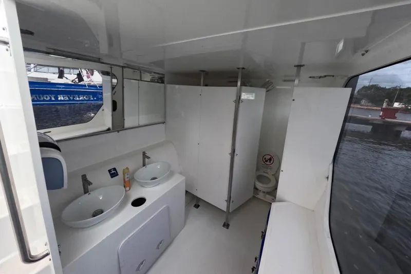 Yacht Photos Pics Interior of 2024 Custom PaxCat 80 boat with dual sinks and restroom facilities.
