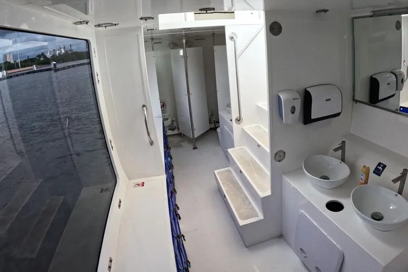  Yacht Photos Pics Interior of 2024 Custom PaxCat 80 boat with modern bathroom and river view.