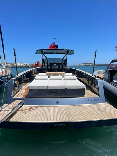  Yacht Photos Pics 2024 Pardo Yachts 43 luxury yacht docked, featuring spacious deck and modern design.