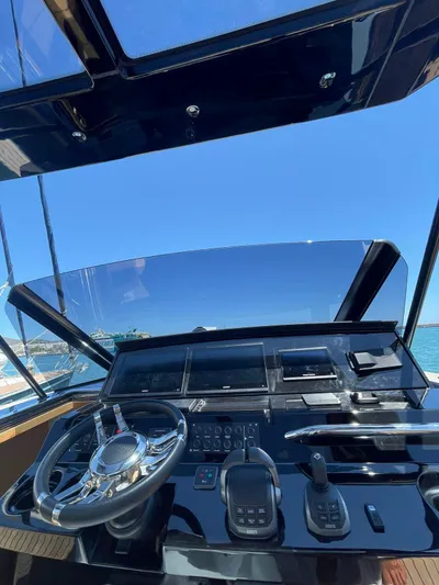  Yacht Photos Pics Helm of 2024 Pardo Yachts 43 with modern controls and ocean view.