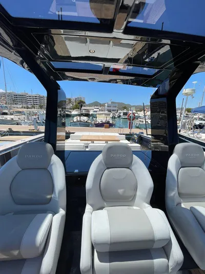  Yacht Photos Pics 2024 Pardo Yachts 43 interior with luxurious seating and marina view.