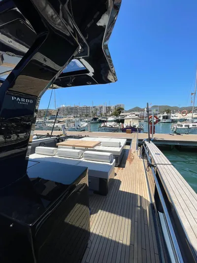  Yacht Photos Pics 2024 Pardo Yachts 43 docked, showcasing sleek design and spacious deck.