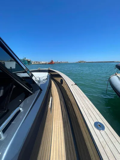  Yacht Photos Pics 2024 Pardo Yachts 43 on calm water under clear blue sky.