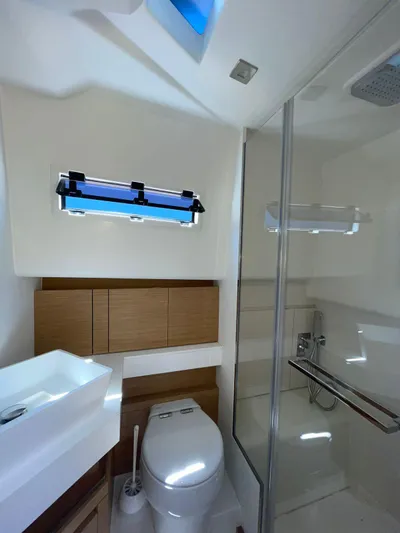  Yacht Photos Pics Luxurious bathroom in 2024 Pardo Yachts 43, featuring modern fixtures and sleek design.