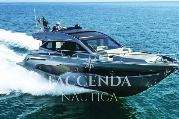  Yacht Photos Pics 2021 Cranchi E52S yacht cruising on open water, showcasing sleek design and luxury.