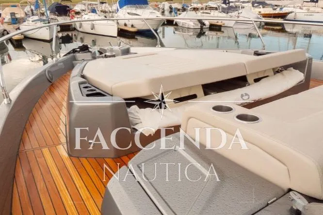  Yacht Photos Pics Luxurious 2021 Cranchi E52S yacht with elegant deck seating at marina.