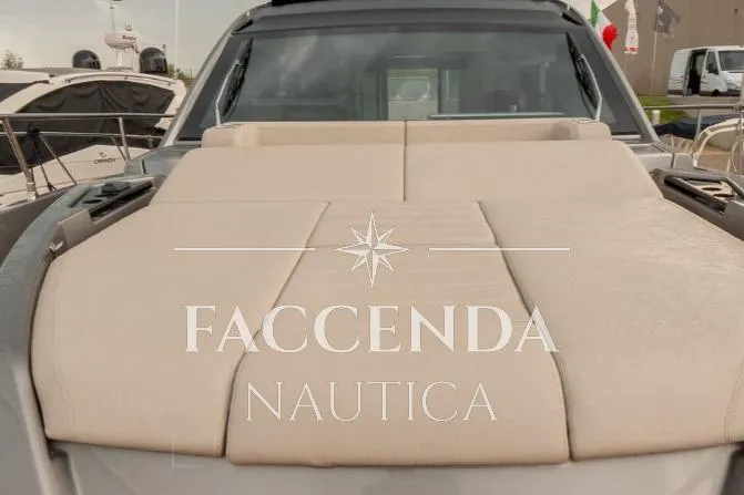  Yacht Photos Pics 2021 Cranchi E52S yacht with beige sunbed, showcased by Faccenda Nautica.