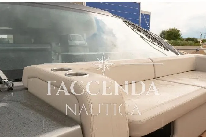  Yacht Photos Pics 2021 Cranchi E52S yacht with beige seating and cup holders, showcased by Faccenda Nautica.