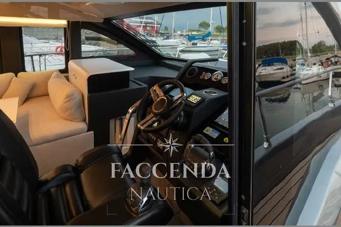  Yacht Photos Pics Interior of 2021 Cranchi E52S yacht with luxurious seating and modern helm.