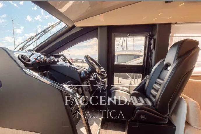  Yacht Photos Pics Interior of 2021 Cranchi E52S yacht with luxurious helm and seating.