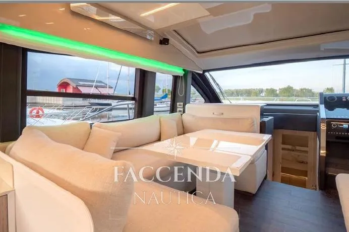  Yacht Photos Pics Luxurious interior of 2021 Cranchi E52S yacht with elegant seating and modern design.