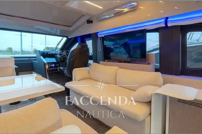  Yacht Photos Pics Luxurious interior of 2021 Cranchi E52S yacht with modern seating and entertainment system.