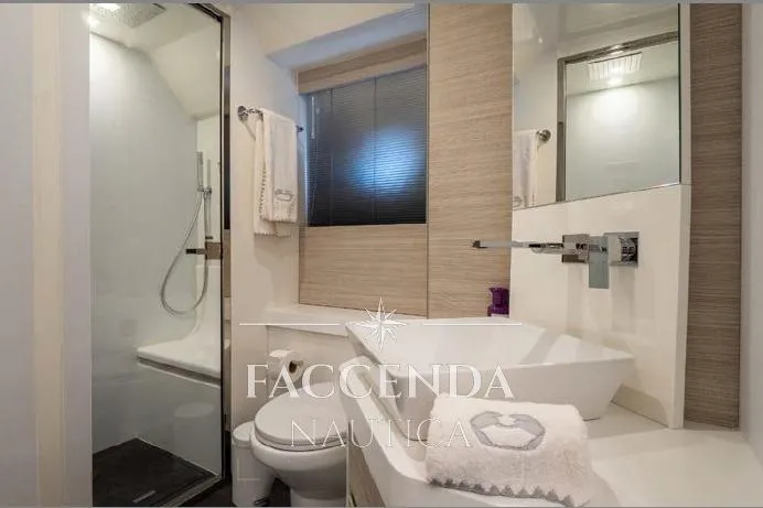  Yacht Photos Pics Modern bathroom interior on 2021 Cranchi E52S yacht, featuring sleek design and amenities.