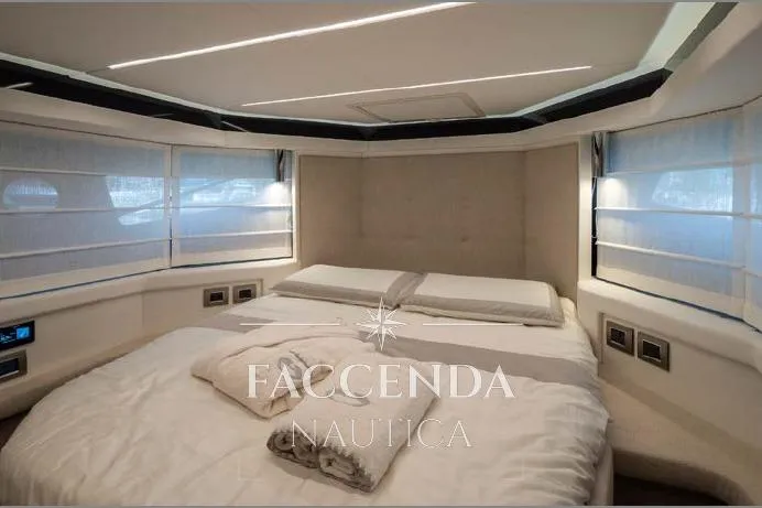  Yacht Photos Pics Luxurious 2021 Cranchi E52S yacht bedroom with modern design and elegant bedding.