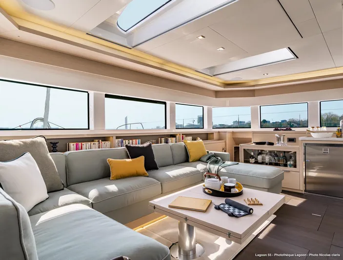  Yacht Photos Pics Luxurious interior of 2024 Lagoon 55 yacht with spacious seating and modern amenities.