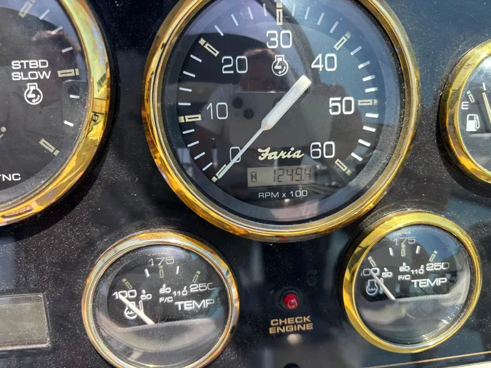  Yacht Photos Pics Close-up of 2000 Cruisers Yachts 3870 Express dashboard gauges, showing RPM and temperature.